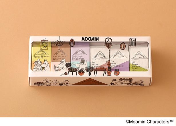 6Pギフト「まったりくつろぐFIKAセット」はパッケージに家の中の暖炉の前でくつろぐムーミンと仲間たちがあしらわれている
