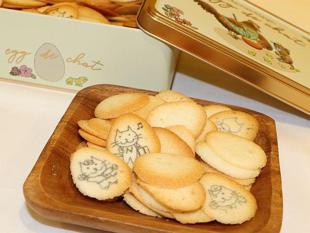 ラングドシャは「ねこの舌」という意味。こちらはJR日暮里駅の人気キャラクター「にゃっぽり」を描いた「エッグドシャ(にゃっぽりver.)」