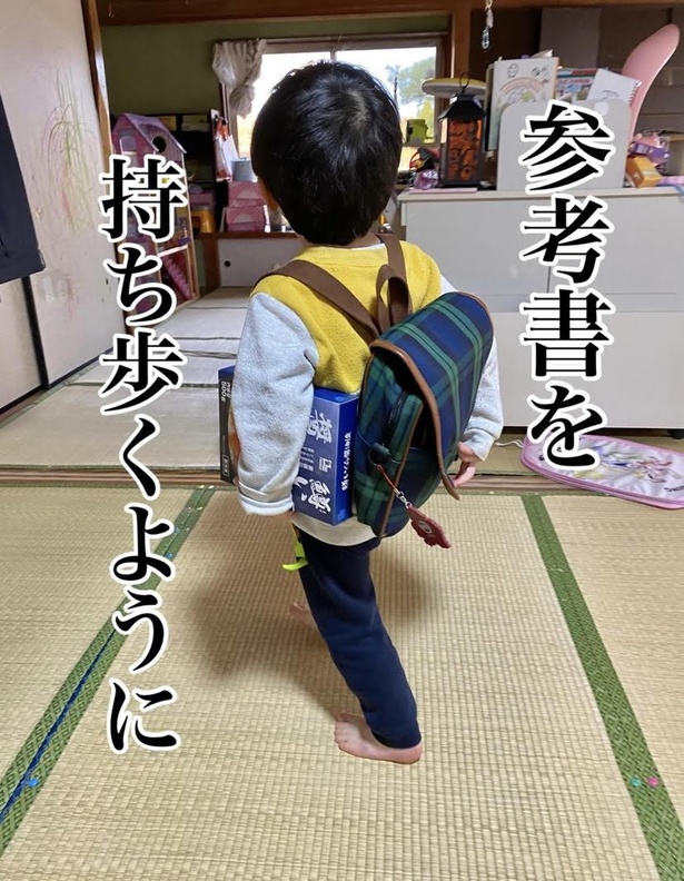 受験を控えた予備校生風の2歳児