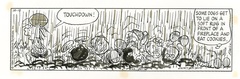 大雨の中、アメフトに夢中なペパーミント・パティ。「ピーナッツ」原画　1994年10月13日
