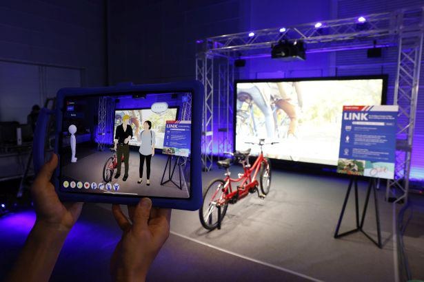 北京予選通過者のアイデア「異文化交流を簡単に楽しめる電動アシスト自転車」