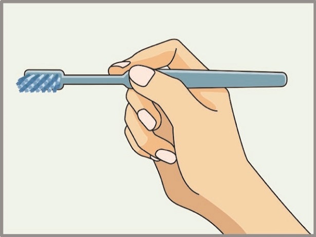 歯ブラシを持つときは、鉛筆を持つように軽い力で