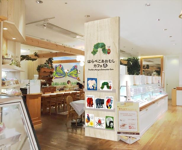 カール氏が描く色鮮やかな植物たちに囲まれながら楽しく食事ができる店内