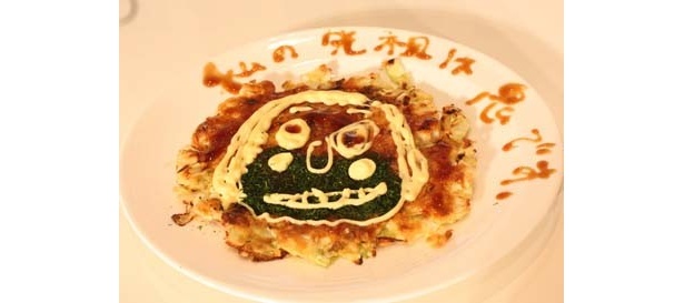 川島の作品は、女の子のイラストと、「私の先祖は鬼です。」とかかれた珍デザイン
