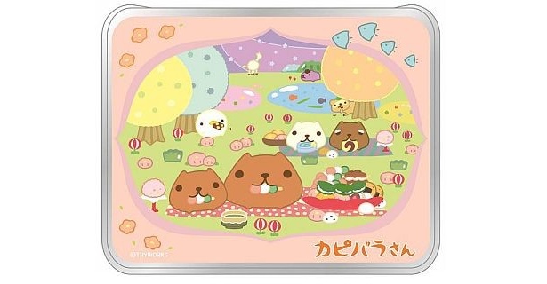 新春を思わせるパステル調デザイン「たぬきさんとお菓子の草原キャンディ缶」(609円)