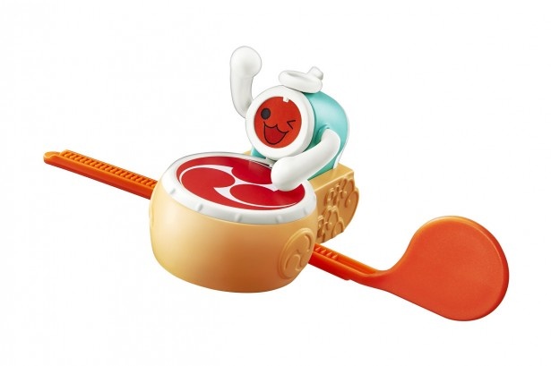 ハッピーセット「太鼓の達人」のオモチャ、ドンドコ どんちゃん。棒を左右に動かすと、どんちゃんが太鼓を叩き、カタカタと音が鳴る　