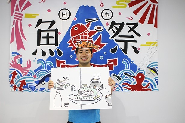 歌と絵で魚の魅力を伝える、さかな芸人ハットリ。イベント開催期間中のステージプログラムに出演予定