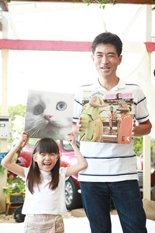 登壇者・松林弘治氏（左）とプログラミングを一緒に楽しんでいる娘さん。松林氏は写真アプリ「インスタグラム」の日本語化にも貢献している。