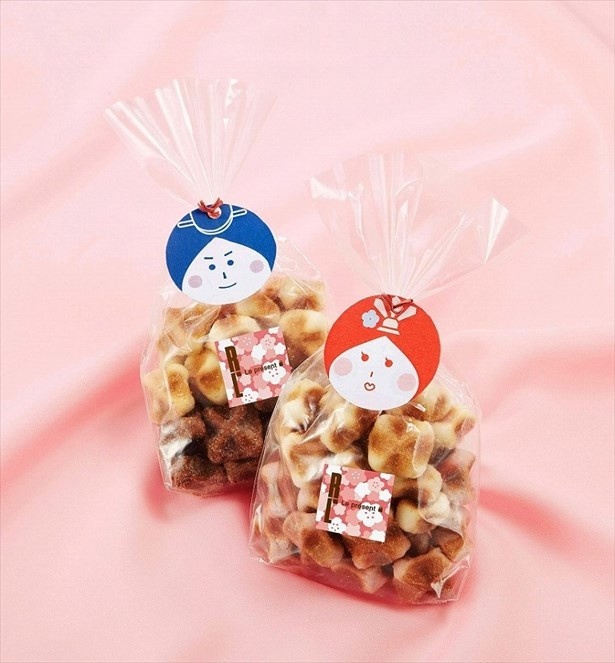 【写真を見る】“おびな”と“めびな”の可愛らしいパッケージのクッキーも発売